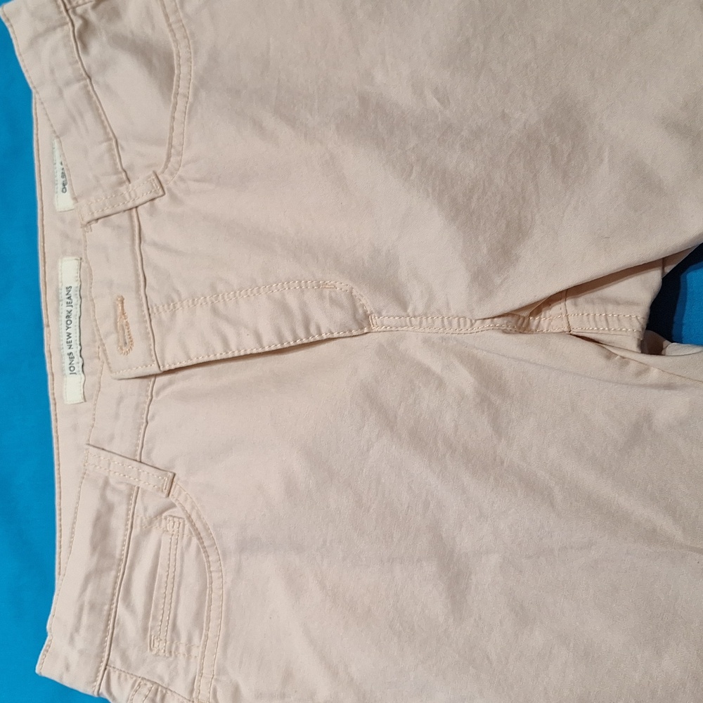 Women's petite light pink stretch jeans.